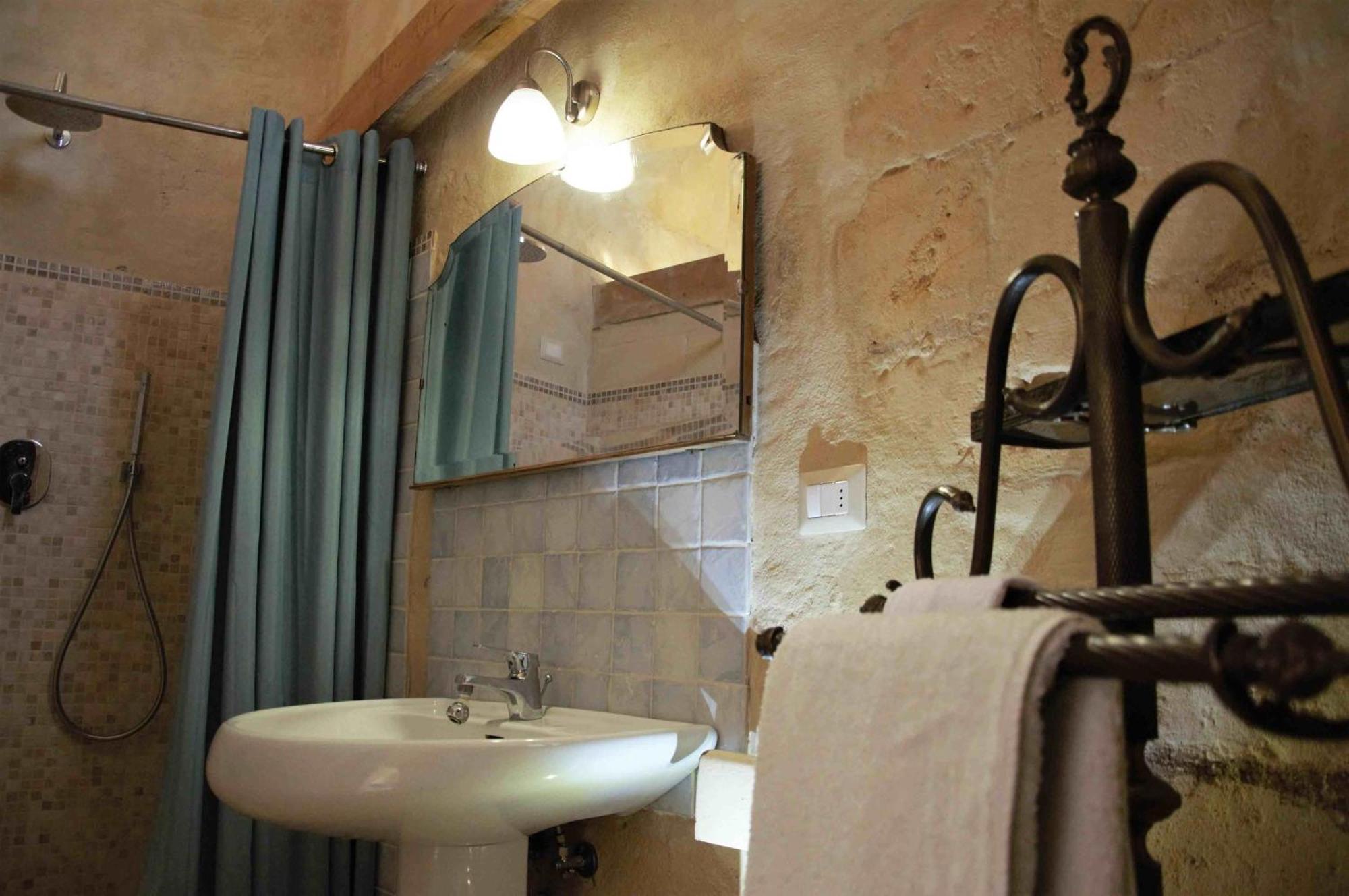 מטרה Cave Rooms Sassi מראה חיצוני תמונה